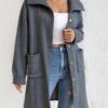 COCOLOGO charcoal marled knit cardigan with ribbed collar and gold buttons over white tube top,