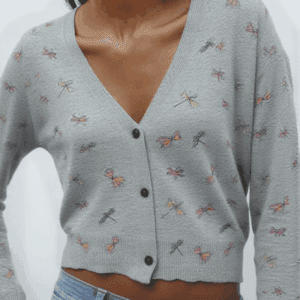 A person is standing against a white background.